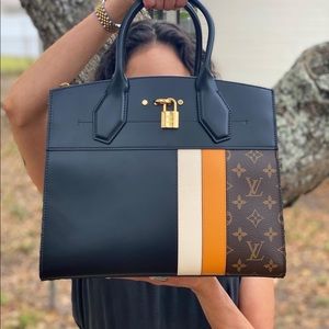 Authentic Louis Vuitton extremely RARE City Steamer Leather Handbag.